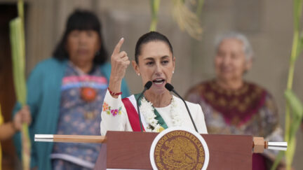 FILE - Newly-sworn in President Claudia Sheinbaum addresses supporters in the Zócalo, Mexico City's main square, on Oct. 1, 2024.