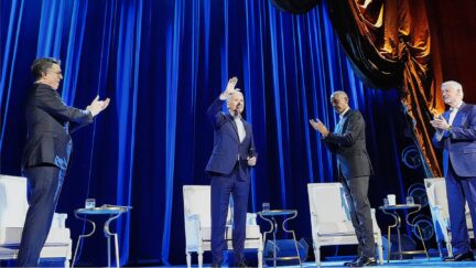 President Joe Biden, center, and former presidents Barack Obama, second from the right, and Bill Clinton, far right participate in a fundraising event with Stephen Colbert, left at Radio City Music Hall, Thursday, March 28, 2024, in New York.